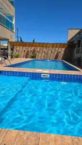 Hồ bơi trong/gần Aurora Peruíbe Hotel