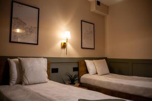 Giường trong phòng chung tại Apartment Bascarsija