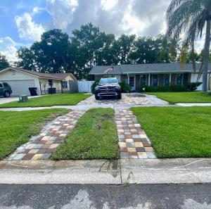 a car parked in the driveway of a house at Beautiful Days in Orange Park