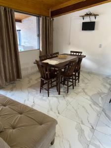 Posezení v ubytování Kitnet Centro da Cidade + 5 fotografií