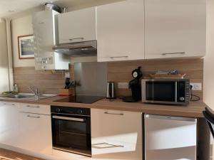 Kuchyň nebo kuchyňský kout v ubytování Côté Criée sur le port de pêche + 11 fotografií