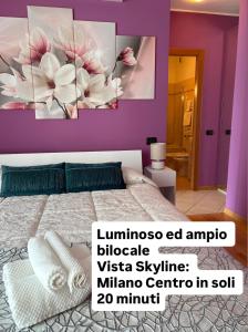 En eller flere senge i et værelse på Skyline 15 Milano - Panoramic Apartment and Free Parking - Metro M1