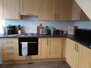 Køkken eller tekøkken på The Orange room