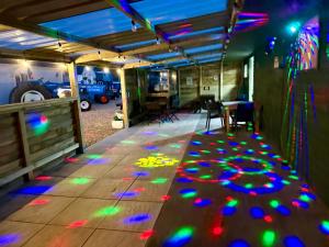 a room with a bunch of lights on the floor at The Beehive in Narberth