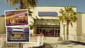 a shopping center with palm trees in front of a building at Airport Master Room in Perth