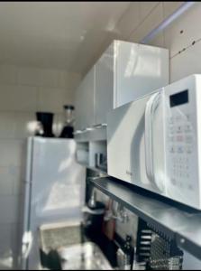 Køkken eller tekøkken på Maré Praiana Rede de Hospedagens