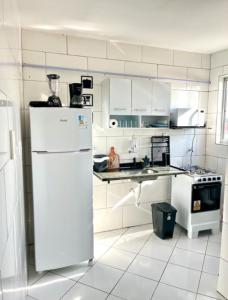 Køkken eller tekøkken på Maré Praiana Rede de Hospedagens