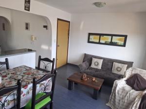 Postel nebo postele na pokoji v ubytování Departamento frente al mar