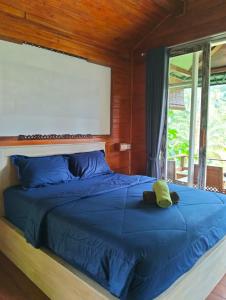 Postel nebo postele na pokoji v ubytování Bali namping