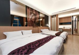 Giường trong phòng chung tại Frontenac IIan