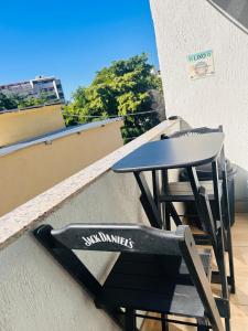 En balkon eller terrasse på Recreio Beach - Suítes - Quarto Família e Quarto coletivo na Gilka Machado