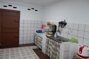 Køkken eller tekøkken på Omah Kuwitan, Traditional Java Home & Hospitality