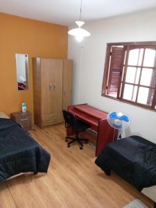 Postel nebo postele na pokoji v ubytování Casa en el centro