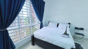 a bedroom with a bed and a large window at PICC Seruling Precinct 5, 62200 Putrajaya 3BR Homestay in Putrajaya