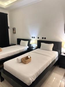 Postel nebo postele na pokoji v ubytování Little White Pavilion小白楼