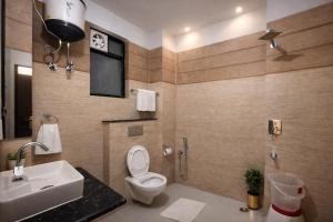 Et badeværelse på Hotel The Costa, Haridwar