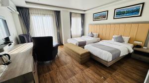 Et tv og/eller underholdning på Maharaja The Royal Hotel