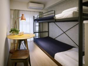 En eller flere senge i et værelse på KARIO Sasazuka