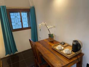 Příslušenství pro přípravu čaje a kávy v ubytování Jacob's Inn