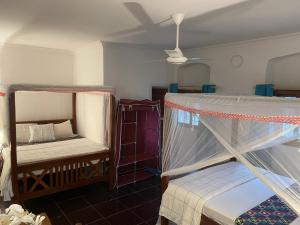 Postel nebo postele na pokoji v ubytování Jacob's Inn