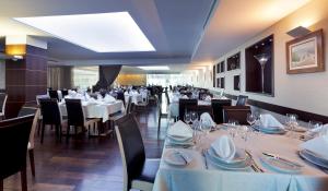 A restaurant or other place to eat at Hotel Lux Fatima