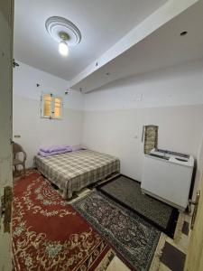 En eller flere senge i et værelse på ELaraby 1