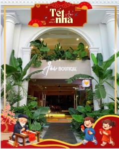 Et logo, certifikat, skilt eller en pris der bliver vist frem på Joi Boutique Bãi Trước