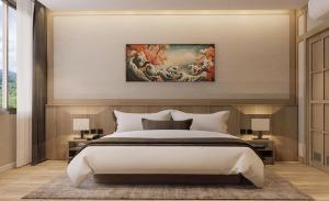 a bedroom with a large bed and a painting on the wall at Zen Essence Khao Yai in Ban Tha Maprang +6 photos