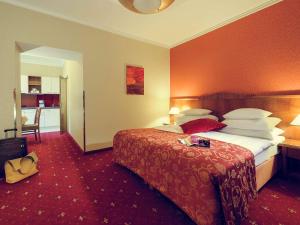 Postel nebo postele na pokoji v ubytování Hotel Josefshof am Rathaus + 37 fotografií