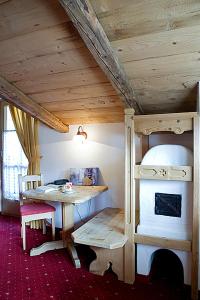 Postel nebo postele na pokoji v ubytování Hotel Garni San Nicolò