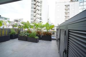 En balkon eller terrasse på Annam Saigon Home