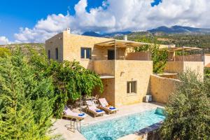 an image of a villa with a swimming pool at Villa Castillo Ena in Agios Nikolaos
