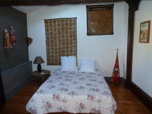 Postel nebo postele na pokoji v ubytování Le gîte de Paxou