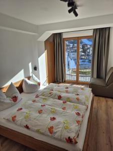 Giường trong phòng chung tại Reiterhof