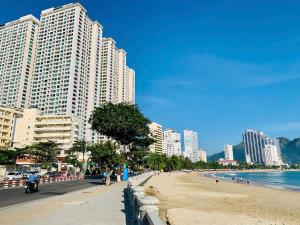 a view of a beach with tall buildings at Media Nha Trang Hotel in Nha Trang