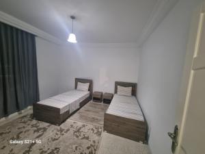 Postel nebo postele na pokoji v ubytování bienvenu chez moi