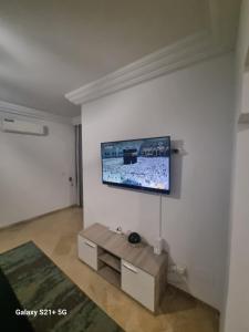 TV a/nebo společenská místnost v ubytování bienvenu chez moi + 1 fotografie