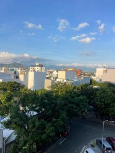 a view of a city with trees and buildings at HomeDubai in Kinh Dinh