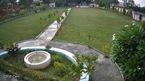 a garden with a bath tub in the grass at Hotel Vijay Greens in Orchha