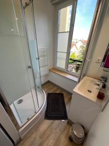 Koupelna v ubytování Entre ville et jardins