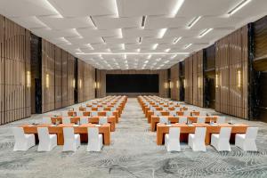 a conference room with chairs and a projection screen at The Westin Yichang in Yichang +78 photos