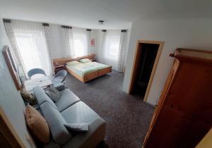 Postel nebo postele na pokoji v ubytování Gästehaus Bader