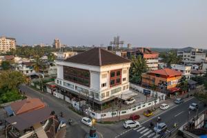 an overhead view of a city street with a building at The Classik Fort in Cochin