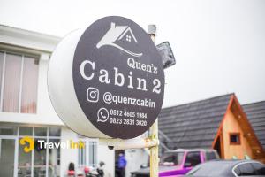 a sign that says calzonearioarioarioarioarioarioarioincial at Quenz Cabin By Travelink in Dieng