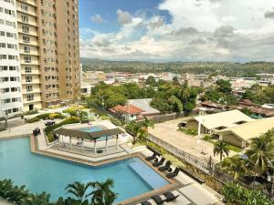 an overhead view of a swimming pool in a city at Oregano Suite- Avida Towers Aspira 2 in Sampong