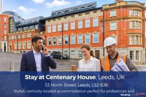 a group of three people standing in front of a building at Prime Leeds- Spacious Cinema apartment in Central Station