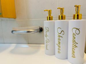 two rolls ofodorizers sitting on a bathroom counter at Breathtaking Valletta Harbour View - Exclusive in Sliema