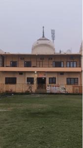a large building with a dome on top of it at The Laxman Palace in Ayodhya +10 photos