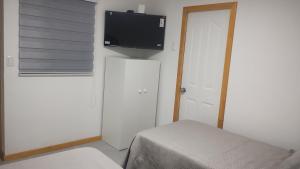 Et tv og/eller underholdning på Hostal GYT