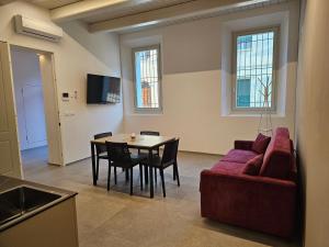 TV a/nebo společenská místnost v ubytování Palazzo Glicine